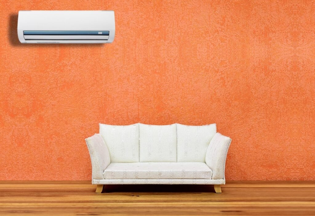 living room with couch and air conditioner